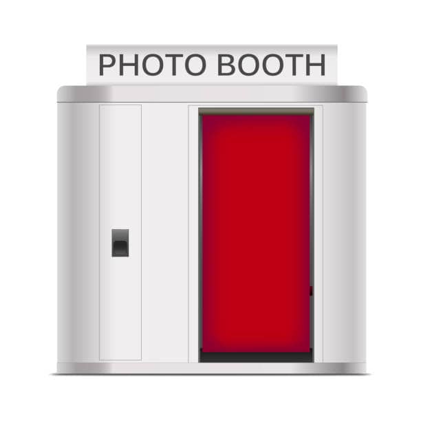 Classic photo booth with a red curtain and "PHOTO BOOTH" sign on top